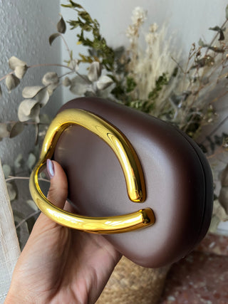 BOLSO CAJA CIERRE DORADO